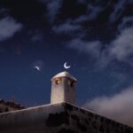 a chimney under a starry sky